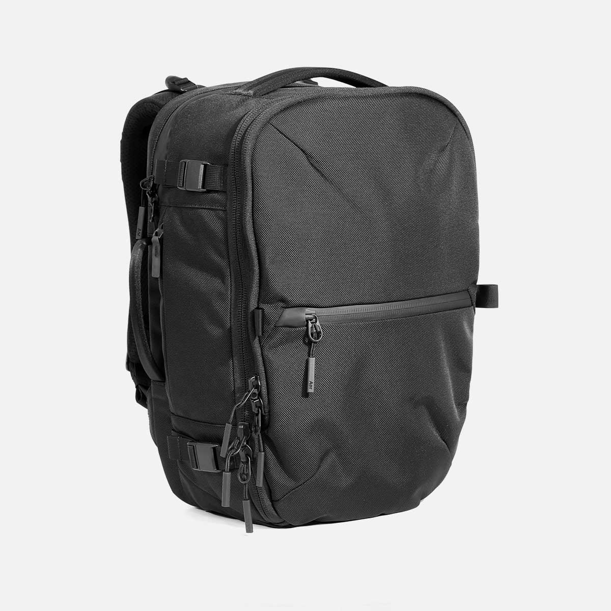 AER21033_travelpack3small_black_34hero.jpg